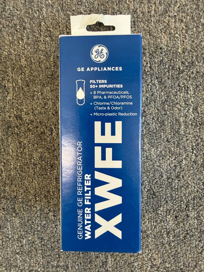 GE Appliances genuine GE refrigerator water filter box, model XWFE, in blue packaging with white text, photographed on a textured carpet background.